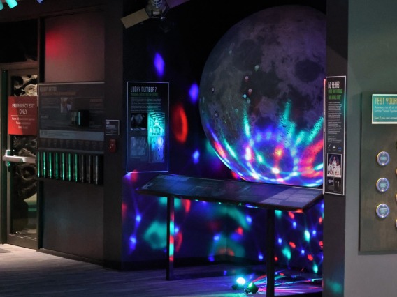 Laser lights on a moon exhibit