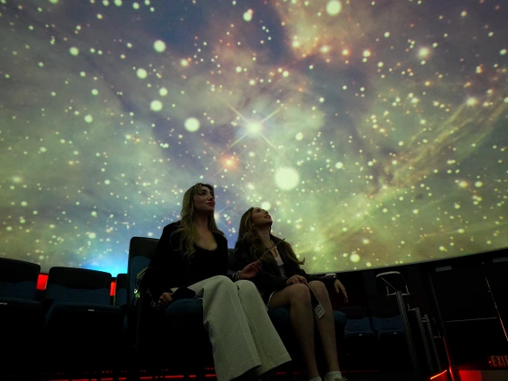 Two-young-women-in-Flandrau-planetarium-tucson